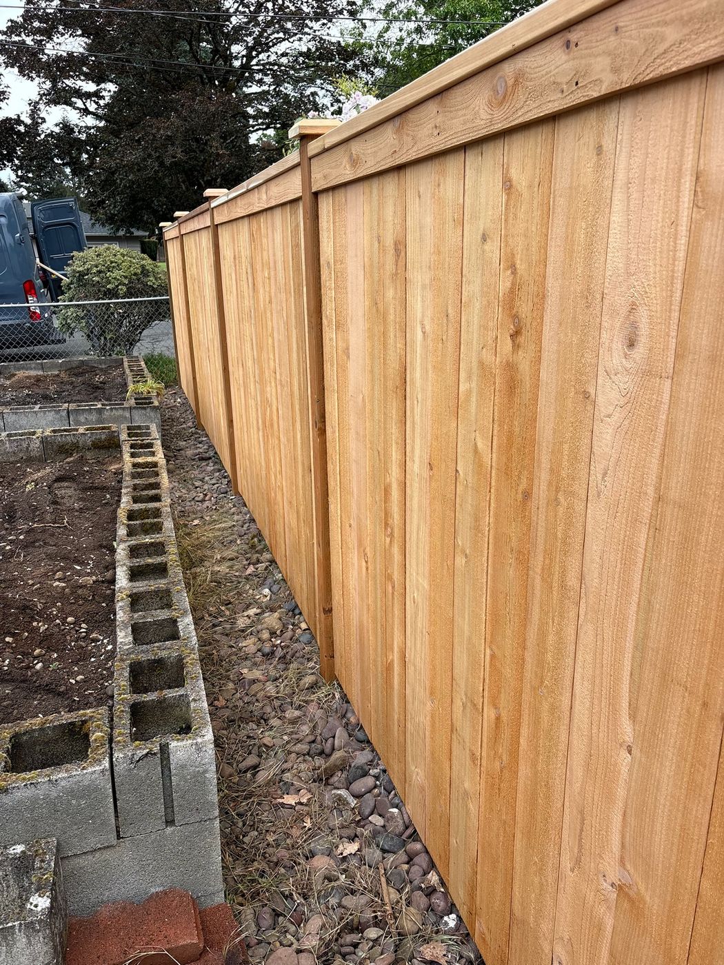 Solid cedar privacy fence built by Gorilla Works along a property line in the Portland, OR area