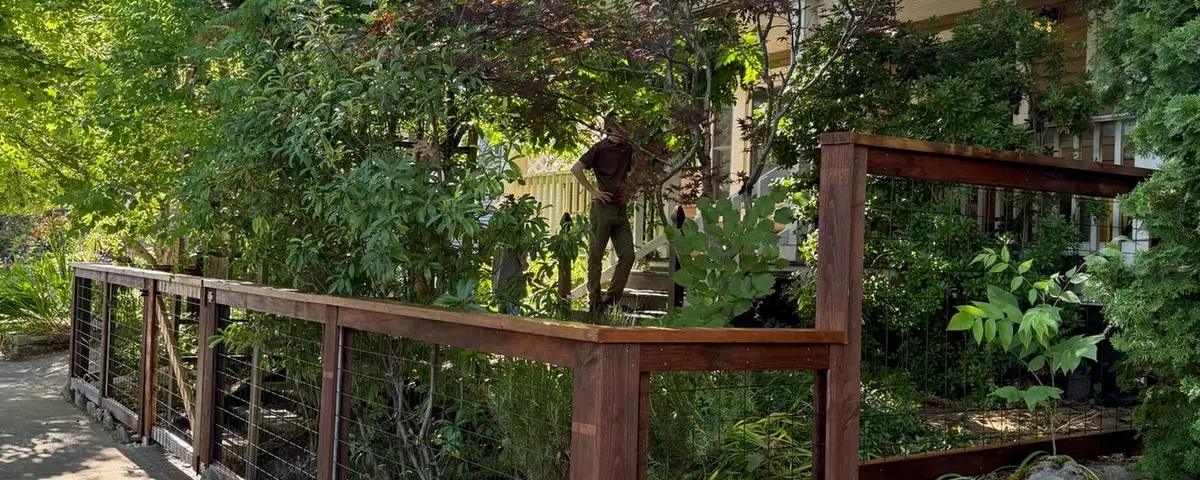 Hog wire fence with a cedar frame installed by Gorilla Works in the Portland, OR area