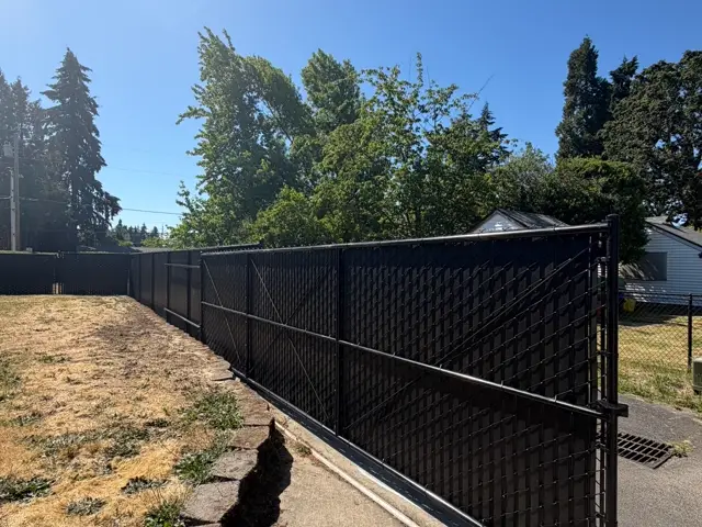 Black Chain Link fence built by Gorilla Works